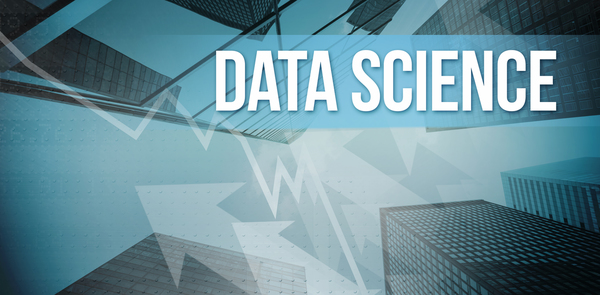 The image shows the words data science with laboratory buildings in the background.